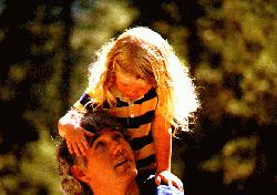 Jim and his daughter Janaki (about 1983).  Click to see a more recent picture on his biography page.